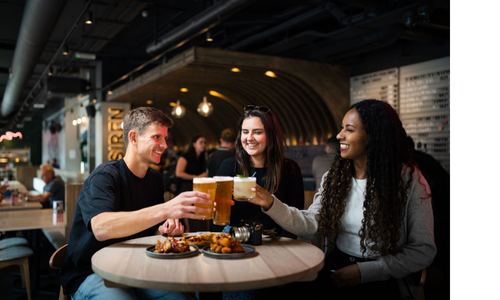 Three friends drinking at Siren