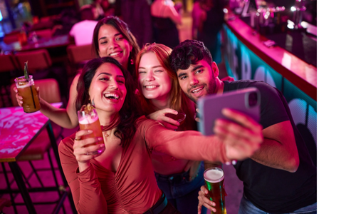 Friends drinking and taking a selfie