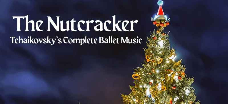 'The Nutcracker' text over Christmas tree